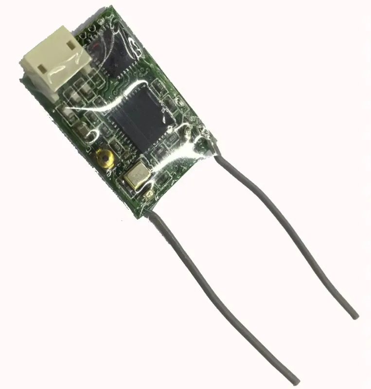 Récepteur R601X 7 canaux DSMX DSM2 2.4GHz pour RC, montrant les ports de liaison et le bouton de bind