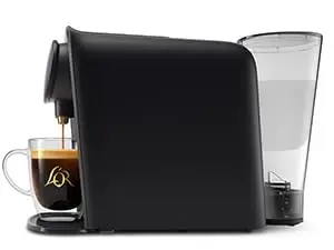 barista side angle showing detachable water tank and coffee cup for scale