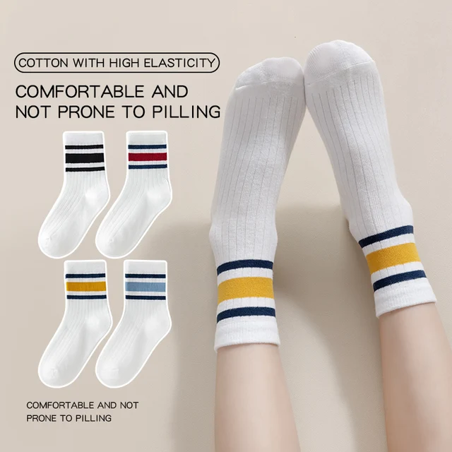 Quatre paires de chaussettes pour enfants pour le printemps et l'automne, style polyvalent rayé, chaussettes mi-mollet avec un style scolaire. 1