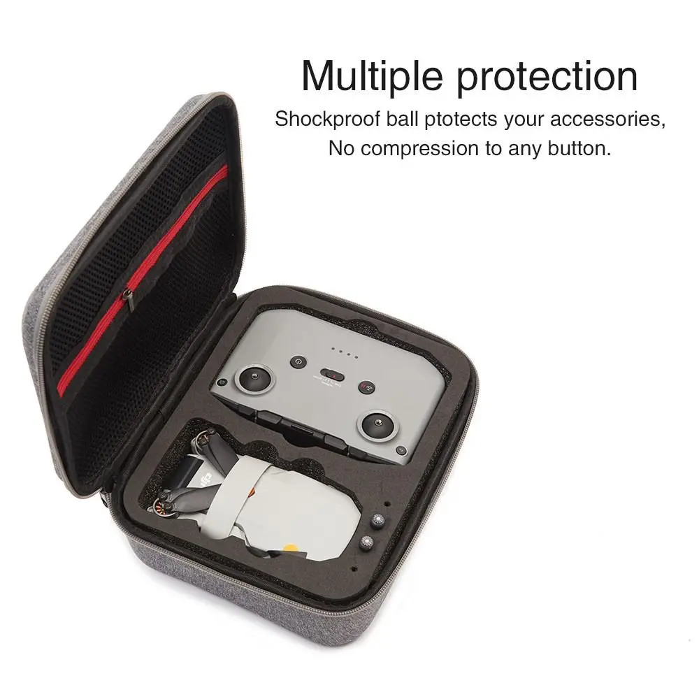 Étui de transport rigide pour DJI Mini 2 et Mini 2 SE, porté à la main, démontrant sa mobilité et protection.