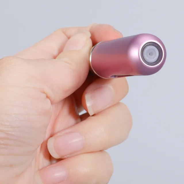 Atomizador de Perfume Portátil para Viajantes Elegantes