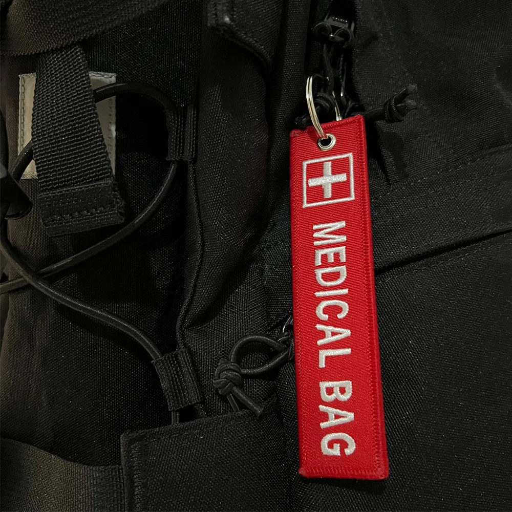 1PC 2PCS 3PCS 3 Packs Sale Cross Logo Medical Bag Both Sides Embroidery Red Tag Keychain Motorcycle Key Accessories