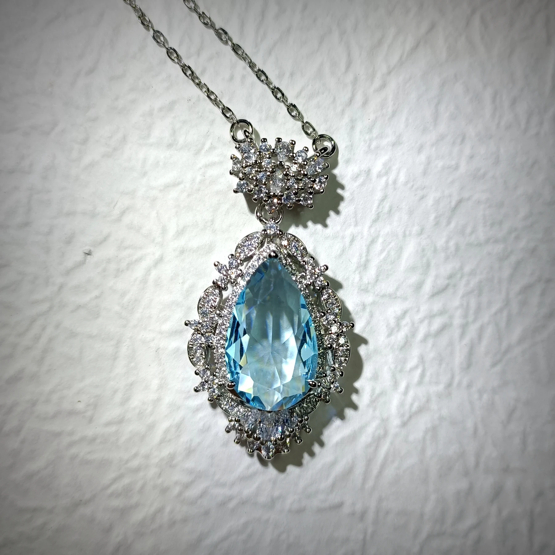 Glamorous Silver Tone Art Deco Ornate Cluster Halo Blue Pear Drop Pendant Necklace Ethereal Jewelry