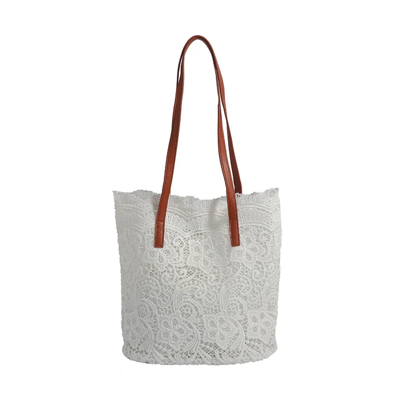 Bolso de hombro de mujer de moda con encaje hueco de venta caliente 2024 Nuevo bolso de mano de gran capacidad personalizado y versátil