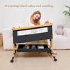 Baby Bassinet, 3 in 1 Bedside Crib for Newborn, 6 Height Adjustable  Easy Folding & with Mosquito Net & Storage Basket & Wheels 4
