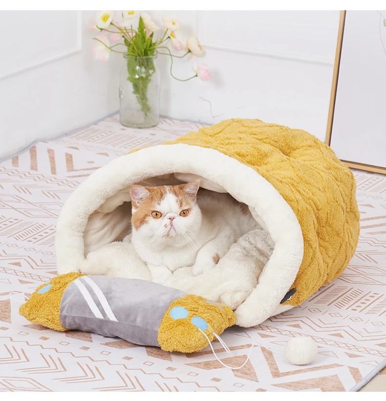 warm and anti anxiety cat bed with a small pillow