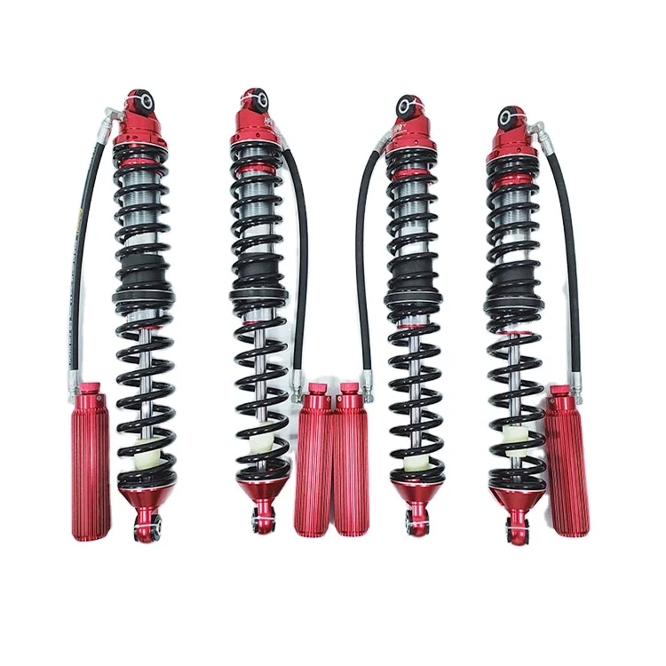 Amortisseur coilover réglable 4X4 pour buggy RC installé sur le châssis, avec bras de suspension et pneu tout-terrain.