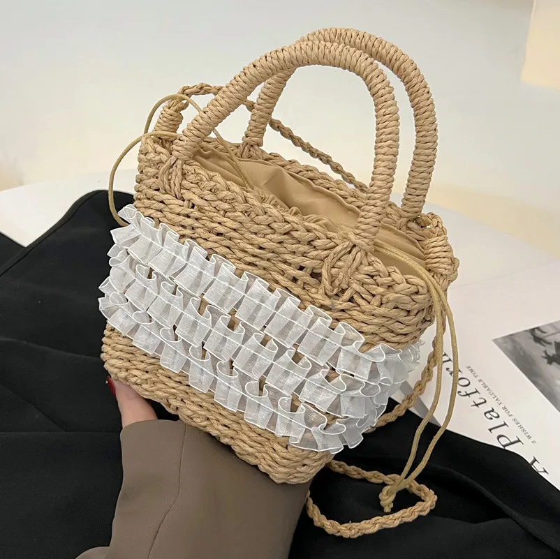 

2023 Women's New Fashion Beach Bag Niche Design Mori Straw Woven Bag Casual Simple Messenger Woven Bucket Bag