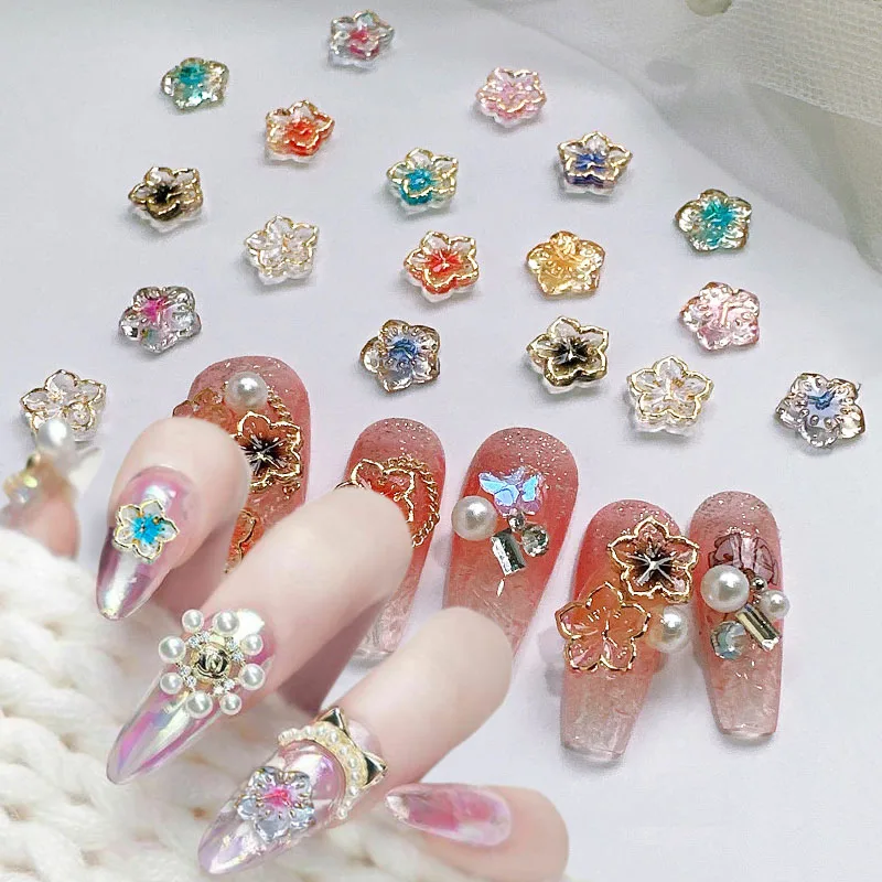 

30Pcs Mix Flower Nail Charms Gold Frame Cherry Blossoms Nail Art Charms Cute Bauhinia Flowers Resin Charms for Nail Decorations