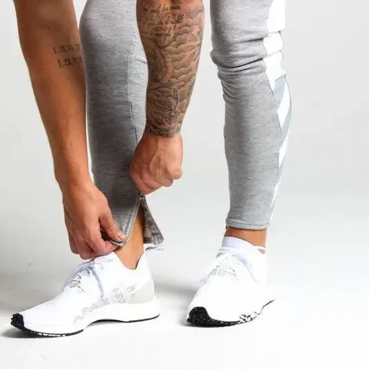 Men's Muscle Fitness Casual Sports Running Training Pants Autumn/Winter Small Footwear One Piece Agent