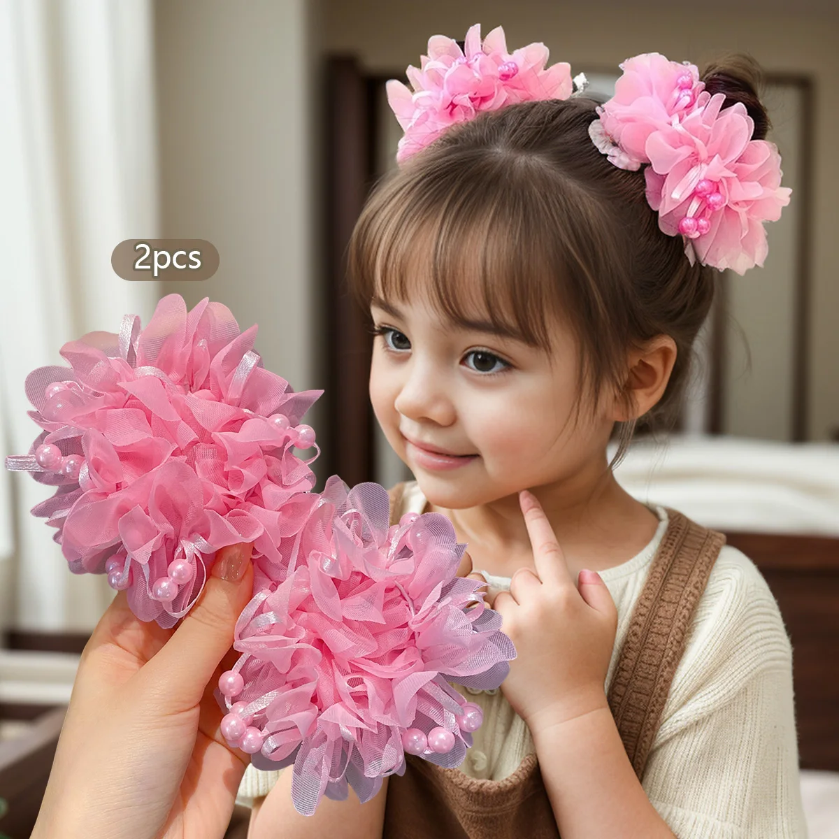 2 cute hair accessories in the form of a pink headband for little girls.