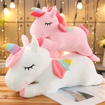 Peluche unicórnio macio rosa ou branco deitado 25cm