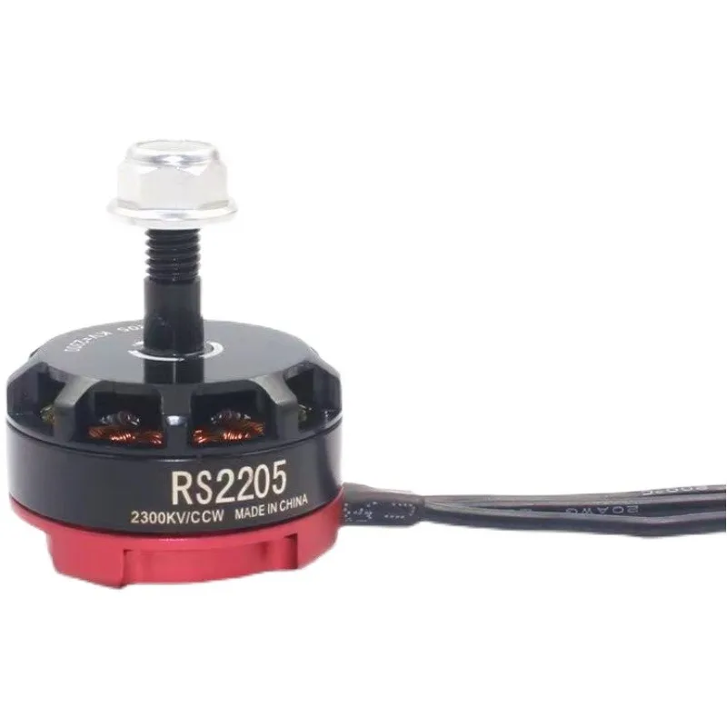 Gros plan sur le rotor du moteur brushless EMAX RS2205 2300KV CW CCW, révélant les aimants internes et le bobinage cuivré.