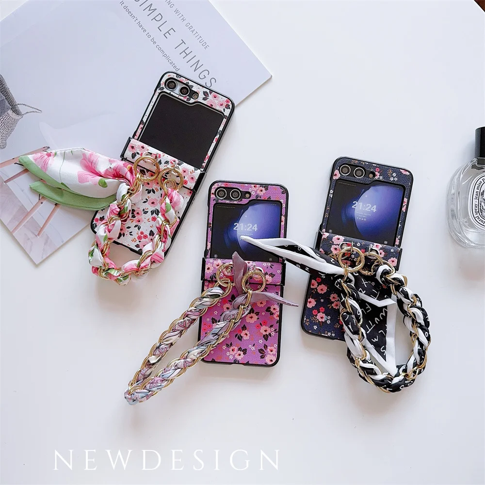 Floral PU Leather Phone Case with Hinge Protection & Scarf Wrist Chain Bracelet Strap