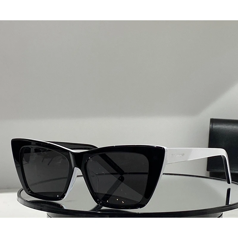 

2023 top quality White patchwork black plate frame sunglasses holiday travel cat eye glasses ladies