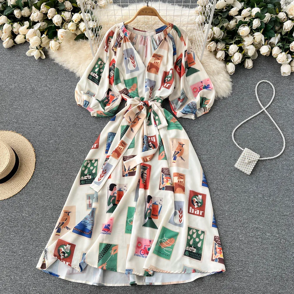 

Dresses Spring and summer new vacation ins celebrity temperament V-neck strap Lantern Sleeve medium length Printed Fashion