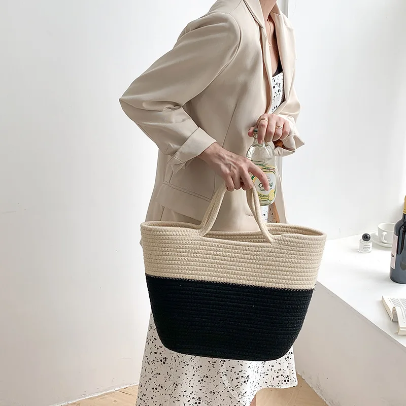 

2023 new bucket bag large capacity fashion handbag niche advanced woven bag women's Arc de Triomphe straw woven bag