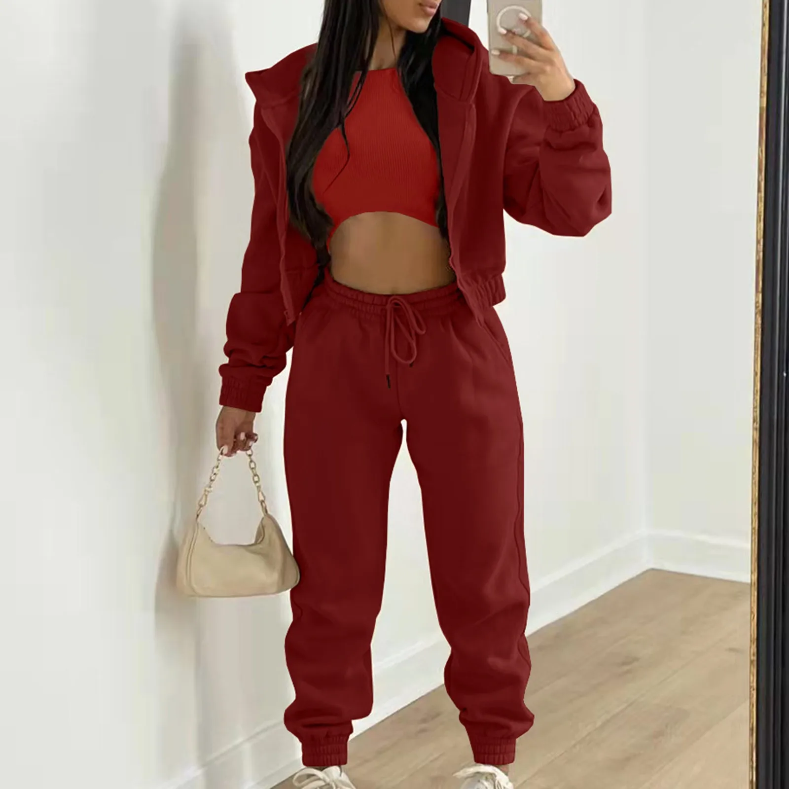 Red women's jogger set sold by 100 Spartans