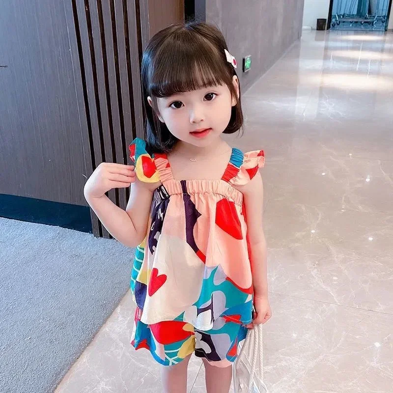 여름  소녀 의류 세트 서스펜더 탑 컬러 매칭 꽃 조끼 + 어린이 캐주얼 바지 작은 어린이 복장