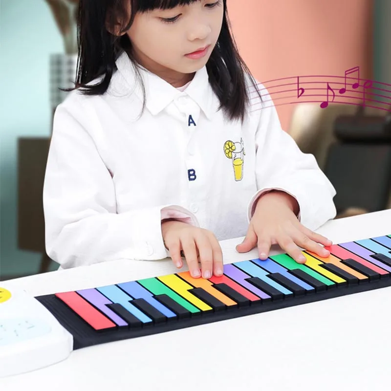 

Roll Up Piano 49 Keys Portable Foldable Colorful Keyboard Hand Roll Electric Piano Rainbow Key Rechargeable Kids Child Toy Gift