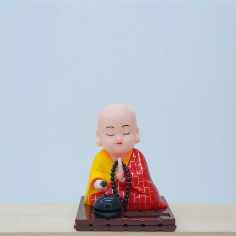 New Cute Little Monk Car Solar Toys Creative Little Monk Shaking Head Nodding Car Center Console Knock Wood Fish Decoratives