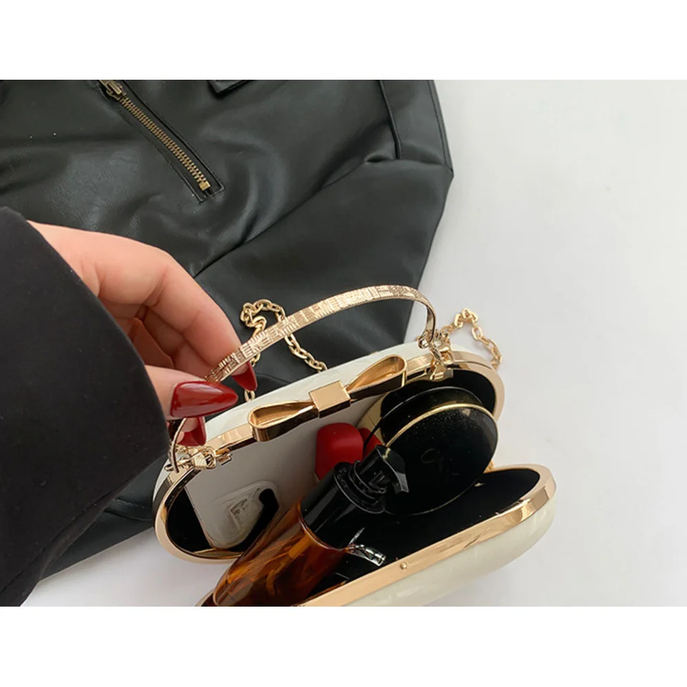 Spring Collection Women's Versatile 2024 New Exquisite Banquet Handheld Chain Shoulder Cross Bag for Women_voghion.com