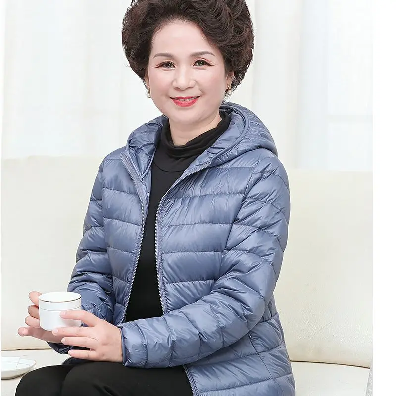 Out-of-season middle-aged and elderly women's light down jacket mother loaded with extra large size warm loose short coat fat.