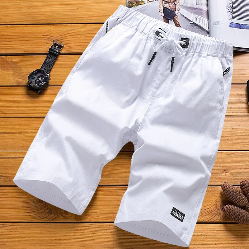 

2023 new summer men's shorts casual white simple and relaxed tide brand five-point sports beach pants pants