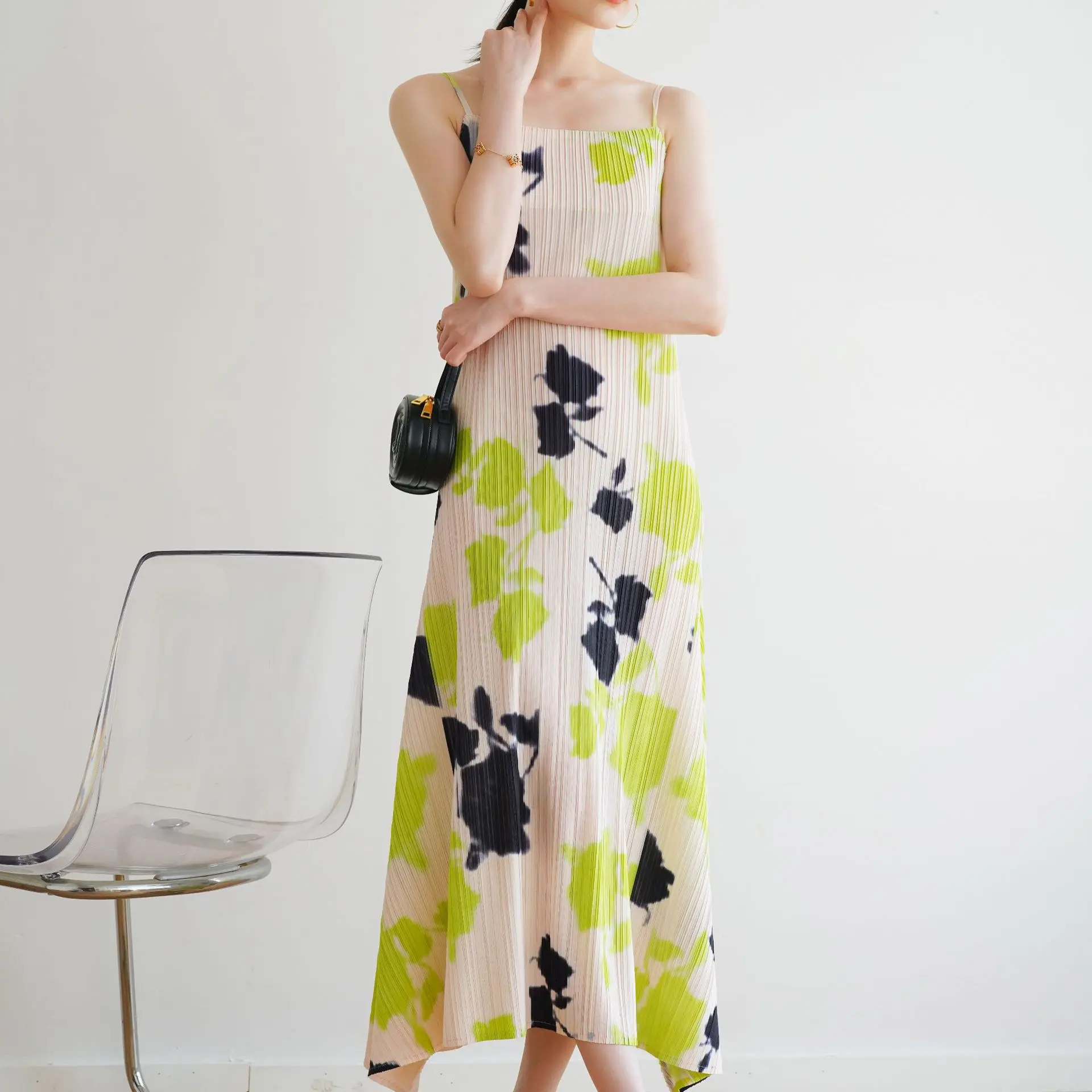 

Women's suspender evening dress Miyake Pleated 2023 summer new flower print holiday wind sleeveless dresses