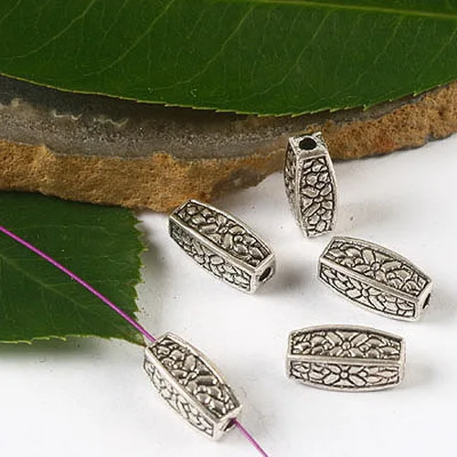 

Бусины-разделители серебряные в виде цветов, 12 Х5 мм, 20 шт.