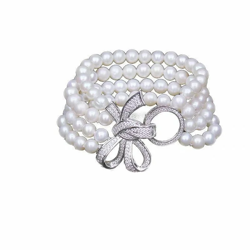 

four strands 5-6mm south sea white pearl bracelet 7.5-8"