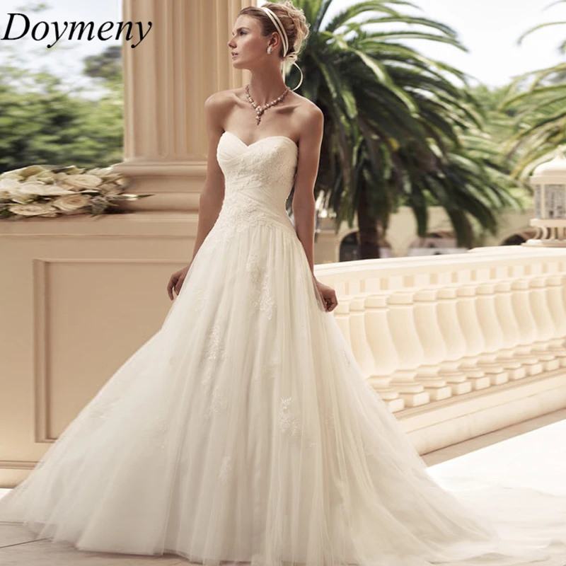 

Doymeny Bridal Beach Wedding Dress Sweetheart Sweep Train Backless Sleeveless Tulle Appliques Pleat Exquisite Robe De Mariée