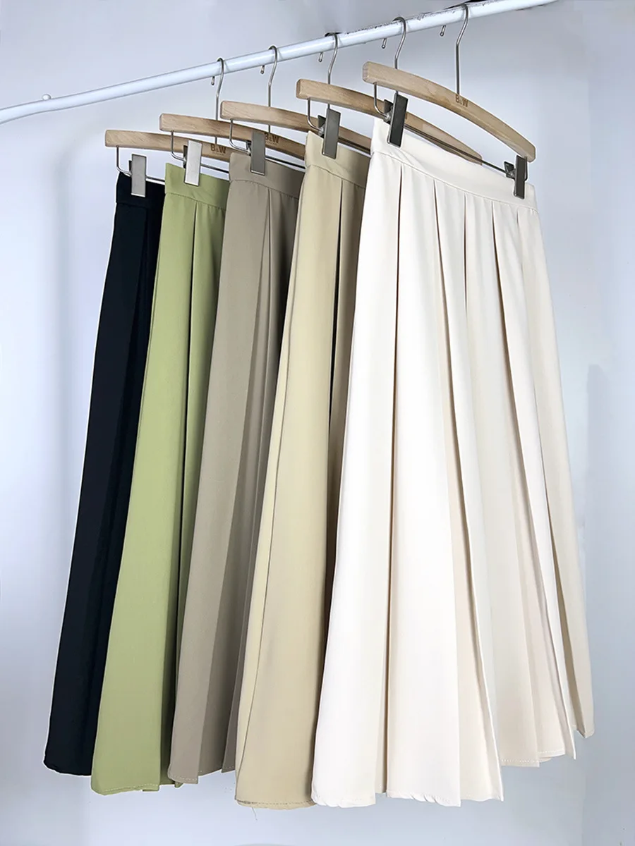 

Solid color suit material pleated skirt for spring-summer 2023 New elastic waist large hem draped medium length A-line skirt