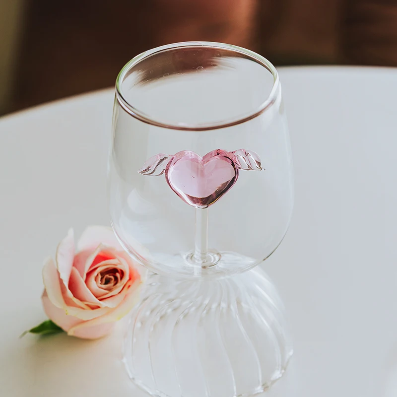 https://ae01.alicdn.com/kf/Sb7659d52d36947f7a9494b6074f7eb5dc/1-PC-350ml-12oz-Ripple-Short-Stemmed-Goblet-Glass-Cup-with-Pink-Heart-Design-Wings-Wine.jpg