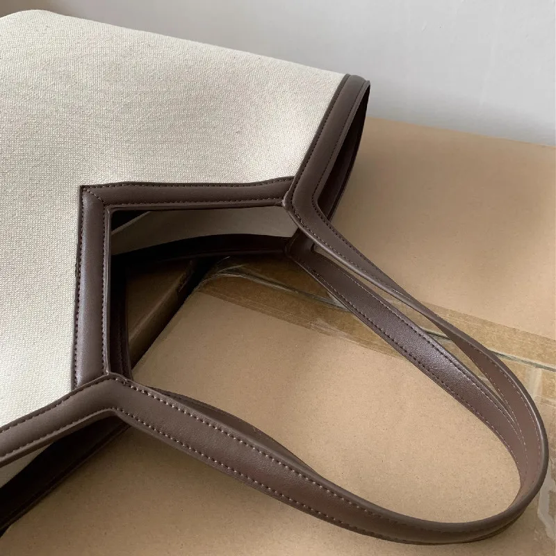 2025 Fashion Versatile PU Canvas Bucket Shoulder and Crossbody Bags Simple Casual Sense of Luxury Retro Handbags for Women