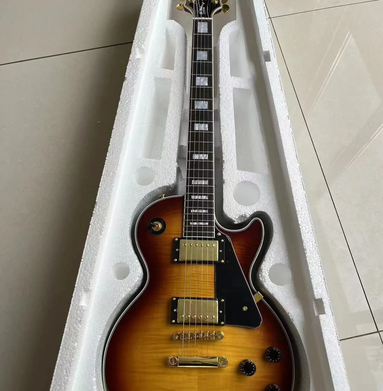 

2024 The factory has inventory of top quality Paul rosewood body rosewood fingerboard flame standard solid electric guitar SDAQ