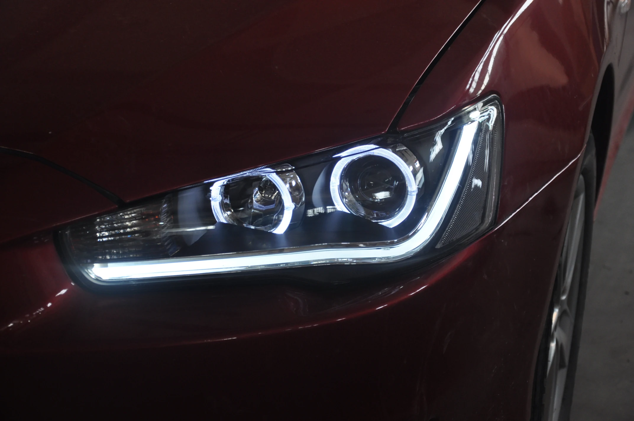 Тюнинг фар mitsubishi. Оптика лансер 10. Фары лансер 10 ауди стиль. Передние фары на митсубиси лансер 10. Тюнинговые фары на лансер 10.