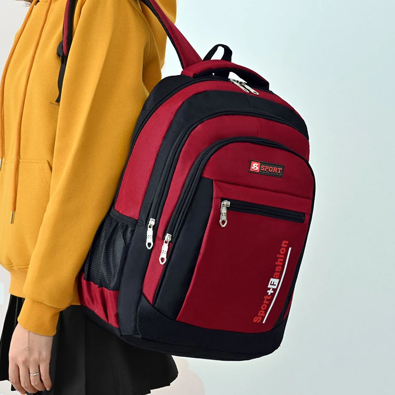 Neutral style backpack for men and women, suitable for students' travel and outings, with multiple pockets for organization 6