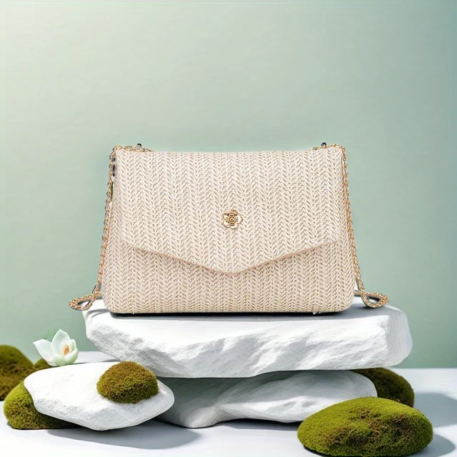 The Korean version is simple fresh and generous women's shoulder bag exquisite camellia with trendy and fashionable straw women