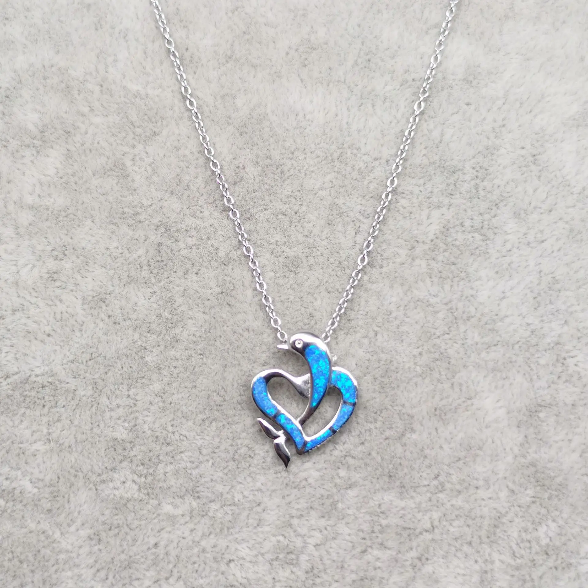 

S925 sterling silver European and American fashion blue Aobao love dolphin pendant sweater chain bone chain necklace