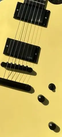 

Irregular electric guitar, made of imported wood, Creamy yellow pearl inlaid fingerboard, EMG active pickup, white light, in sto