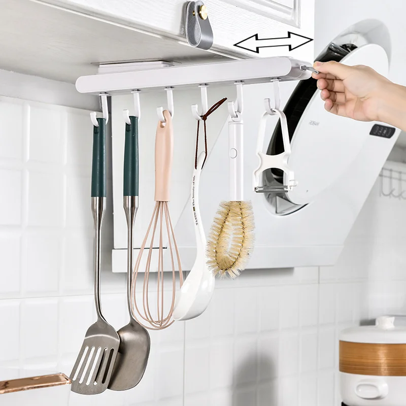 https://ae01.alicdn.com/kf/Sb7e0d571168741a48dacd203ba516cc14/Under-The-Cabinet-Wall-Hanging-Retractable-Pull-out-6-hook-Kitchen-Non-punching-Kitchen-Utensils-Storage.jpg