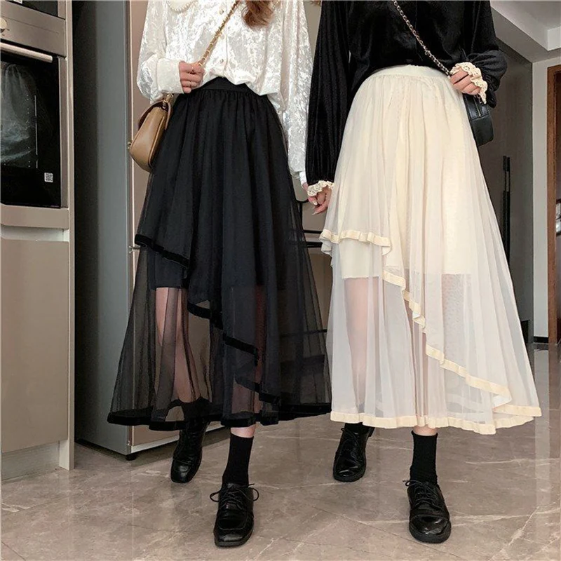 

Sexy and fashionable spring new high-end hanging cake skirt mesh skirt irregular patchwork puffy skirt mid length skirt