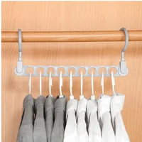 9 hole magic clothes hanger multi-function folding hanger rotating clothes hanger wardrobe drying clothes Hanger Home Organizer 1