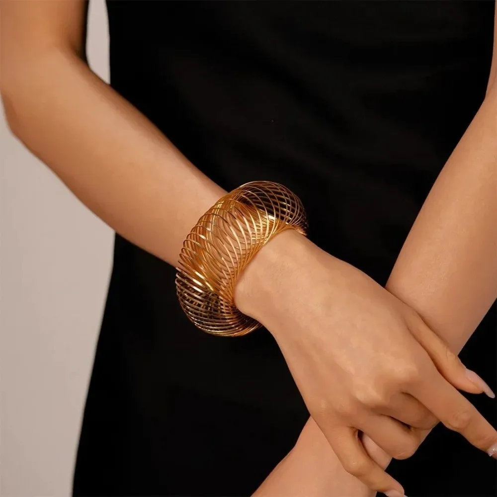 Round Shape Elastic Bracelet Geometric Design Exaggerated Style Hollow Out Bracelet Spring Mechanism Flat Wire Metal Bracelet