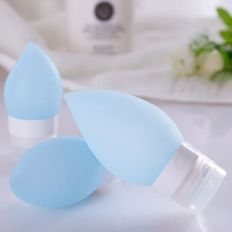 thumbnail image 1 of Envases rellenables de silicona con forma de gota de agua de 38 ml/60 ml/89 ml, juego de viaje, botella de emulsión, champú, gel de ducha, botella de almacenamiento para cosméticos, 1 of 5