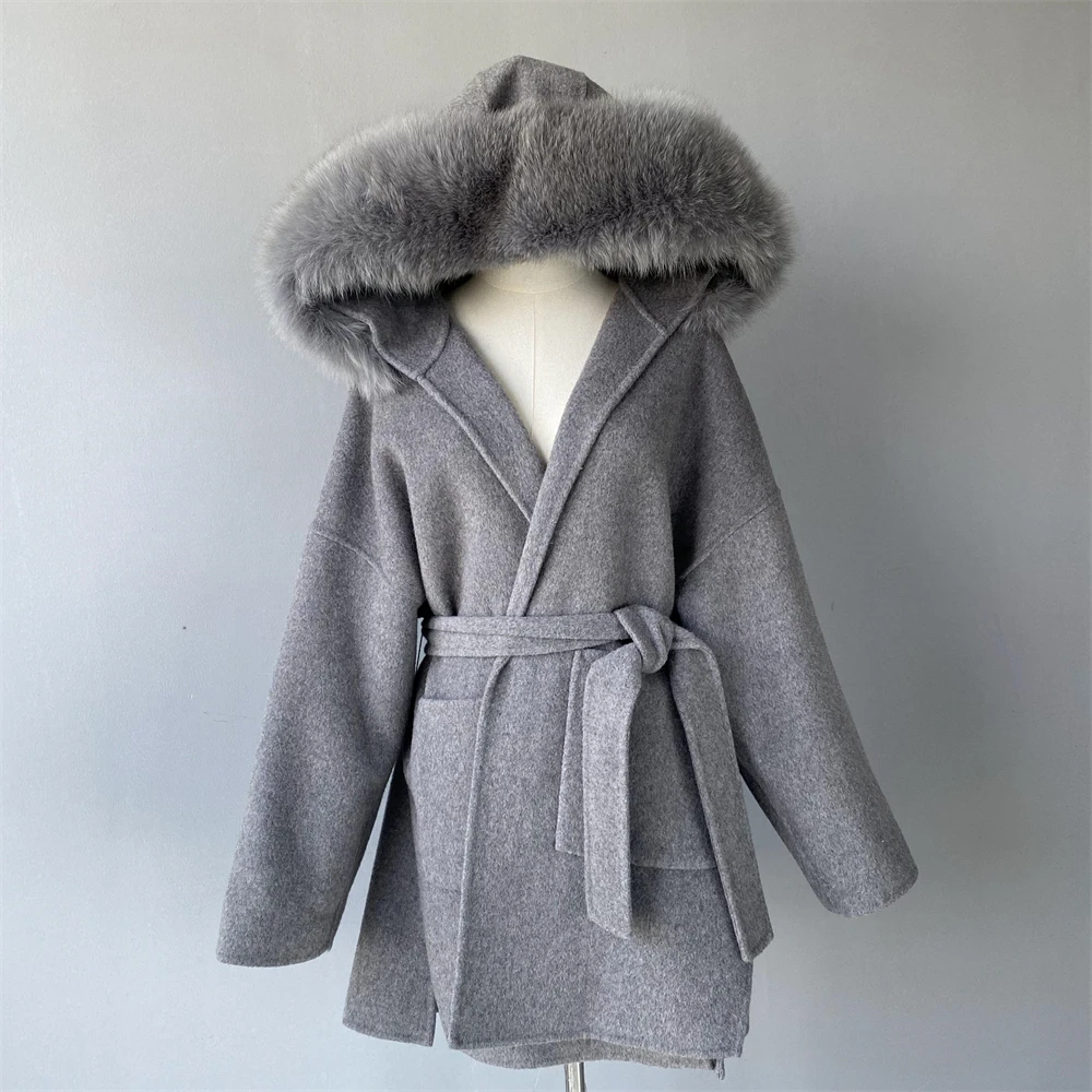 Cashmere wool coat with fox fur hood - luxurious detail shot