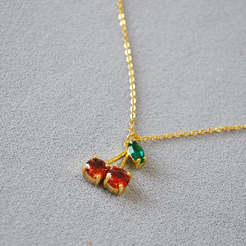 

Japanese and Korean niche minimalist exquisite brass plated with gold, sweet cute red cherry pendant, personalized
