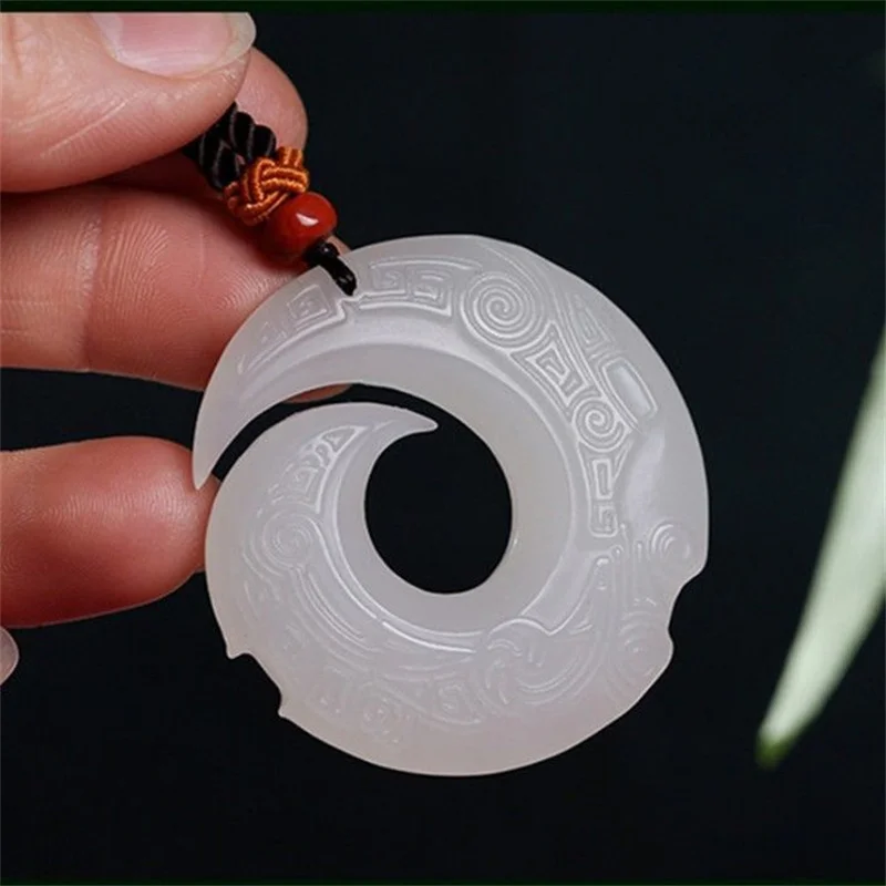 

Natural Xinjiang Hotan lanolin grade Afghan white jade single-sided jade turn safe buckle reincarnation pendant jade pendant