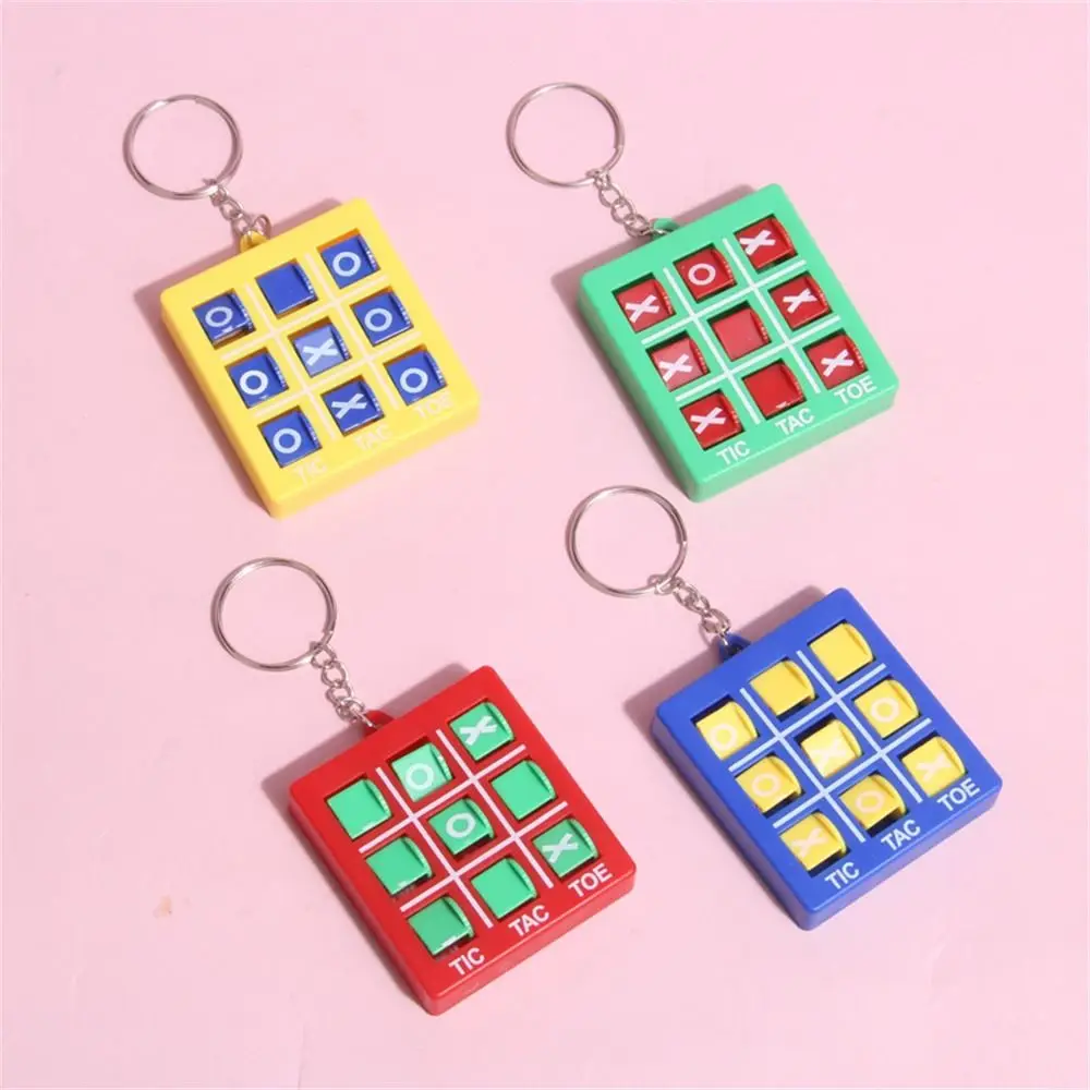 

1Pcs Kids XO Rotating Game Chess with Keychain Pendant Puzzle Round Fork Chess Toys Kids Gift